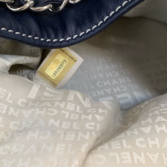 CHANEL Navy Drawstring Lambskin Diamond Stitched Bucket Bag with Medallion - Picture 10 of 17